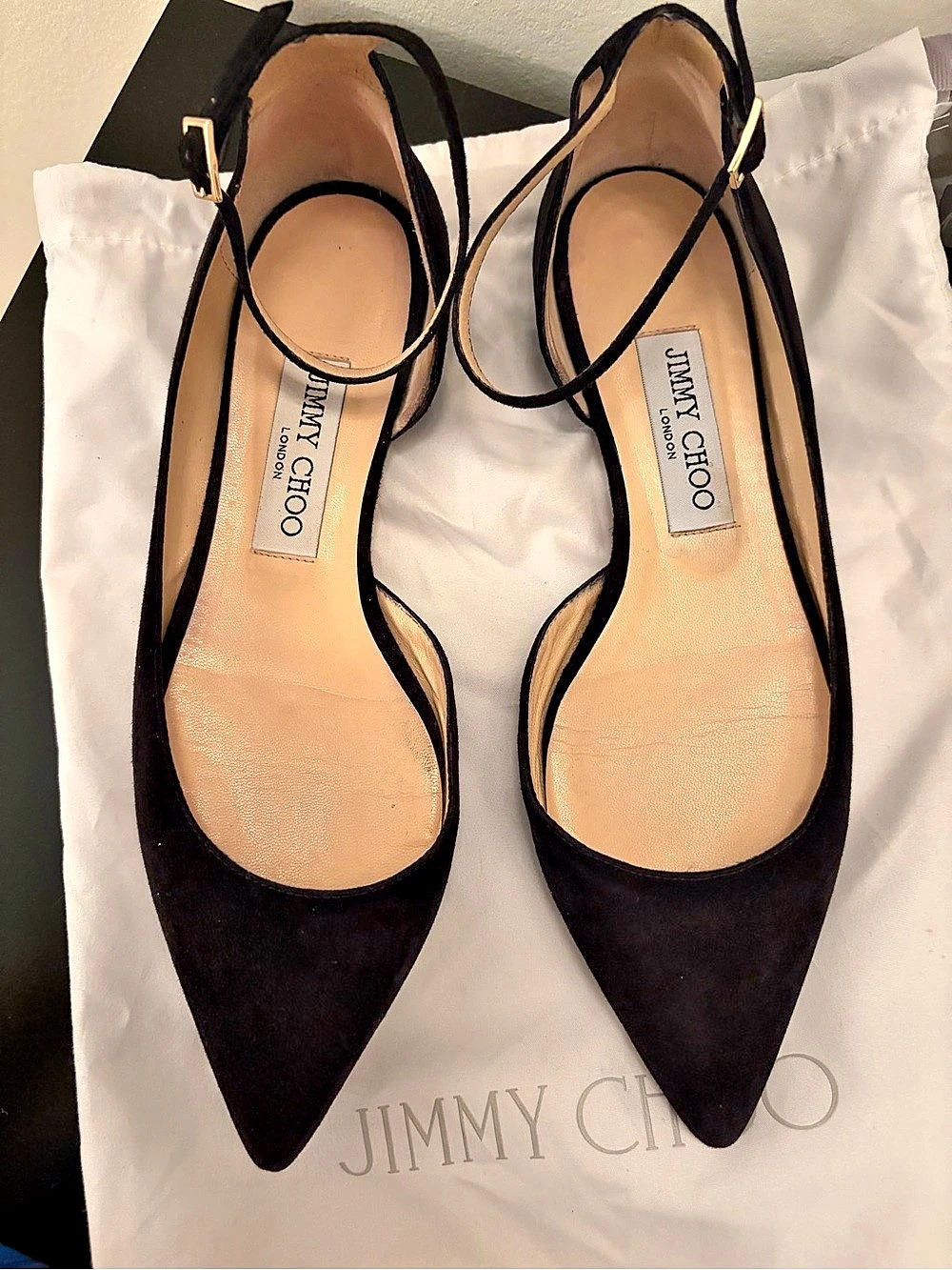 Jimmy Choo Suede Lucy Flats in black, featuring a pointed toe and d’Orsay sz 7